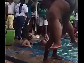 Big Negro old lady in swimming poolparty